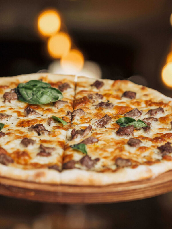 mixed-ingredient-pizza-wooden-board